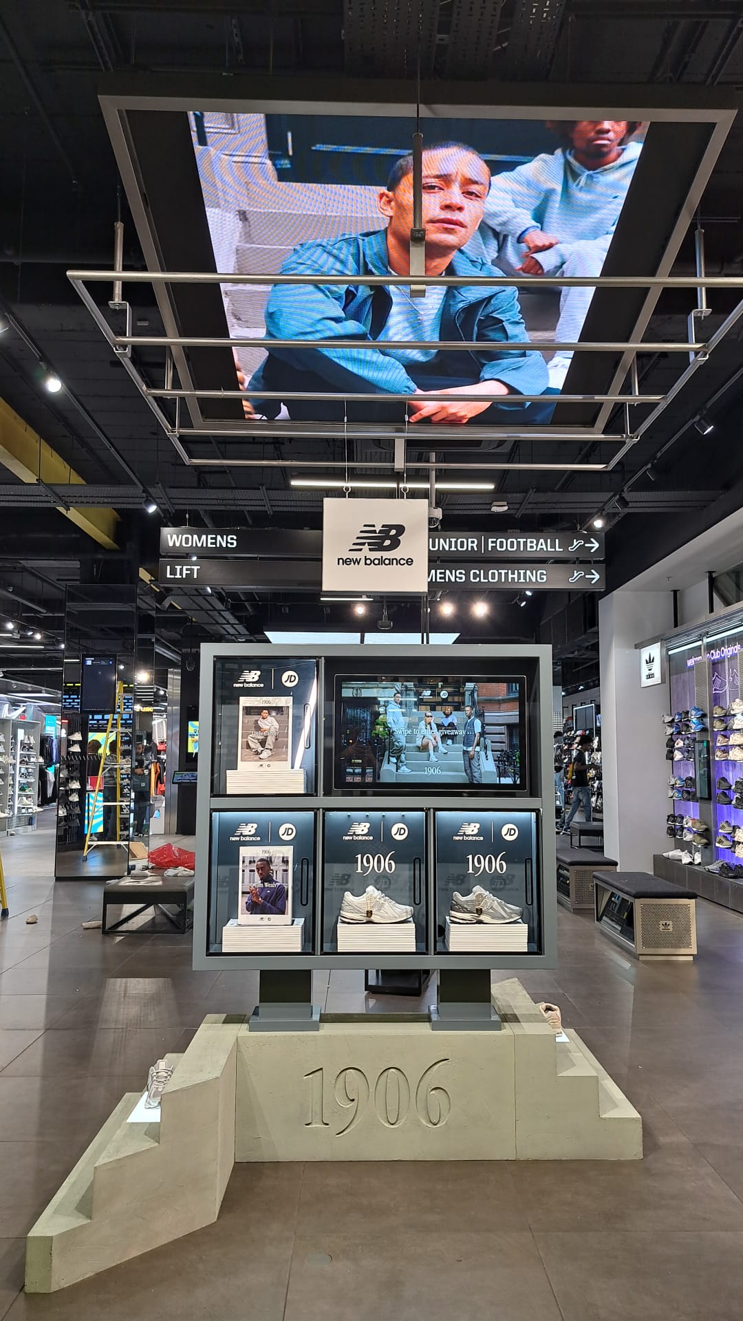 Nike Tech podiums with integrated LED display panels at JD Sports Oxford Street London