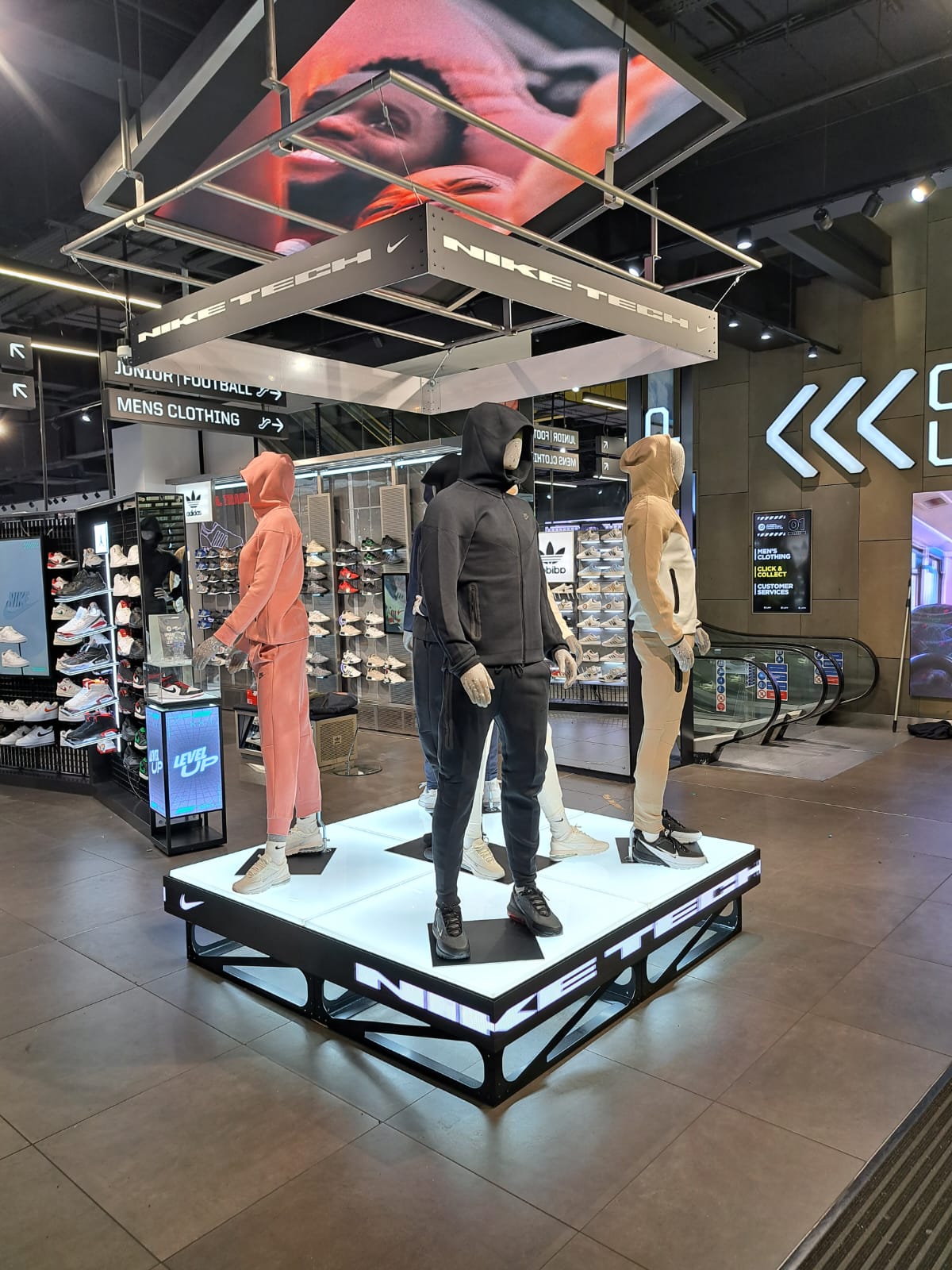 Nike Tech podiums with integrated LED display panels at JD Sports Oxford Street London