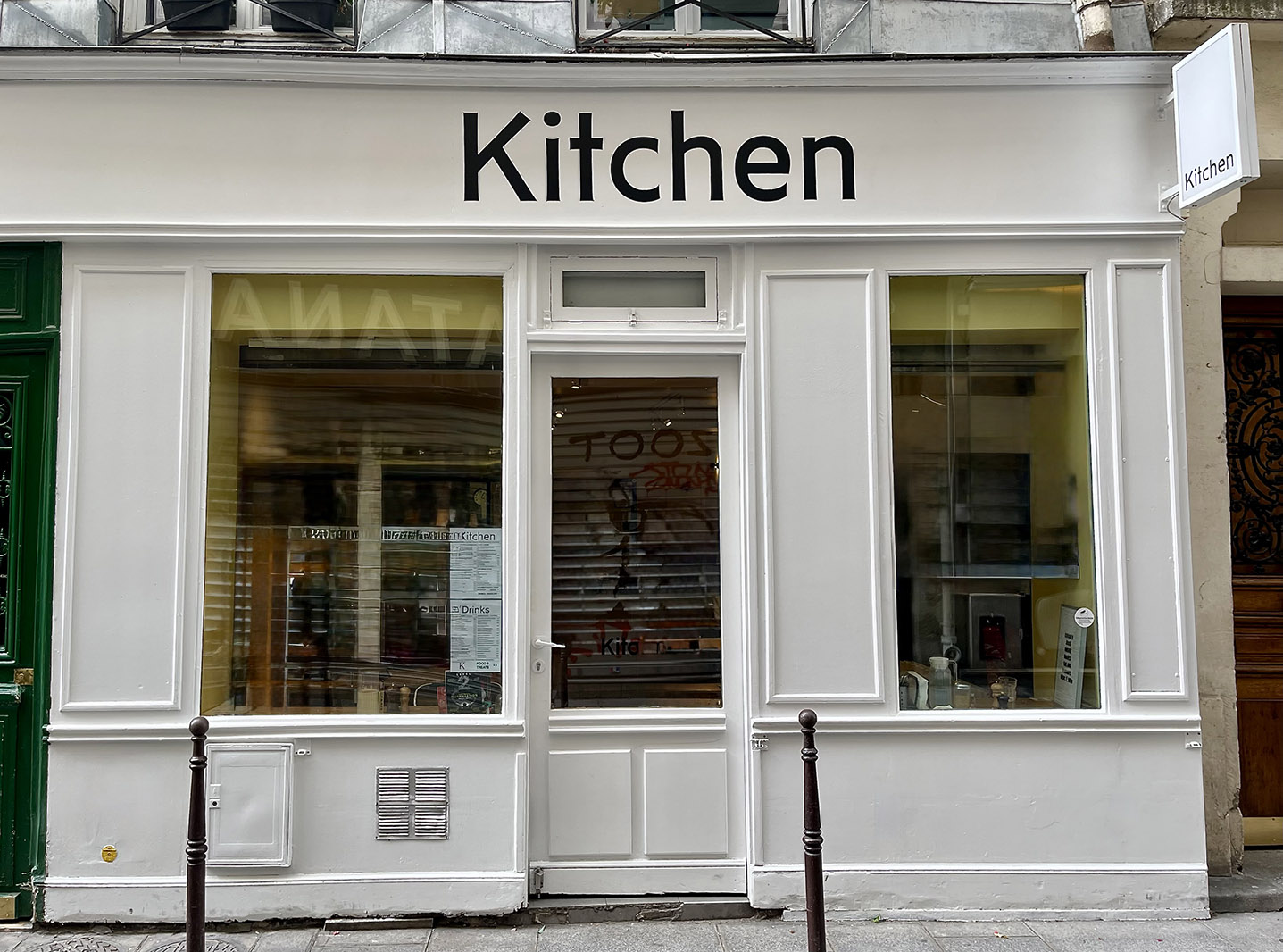 Painted sign using stencilled vinyl guide with renovation and fixing of exterior facade
